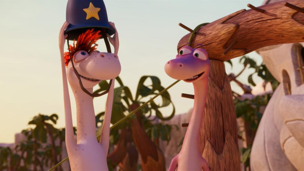 Flint (links) setzt sich den Helm vom Sheriff auf den Kopf. Minus Drei (rechts) schaut ihn begeistert an.