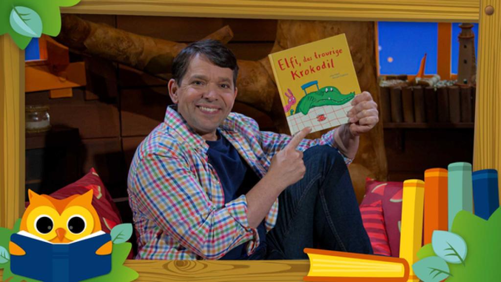 Juri liest das Kinderbuch: "Elfi, das traurige Krokodil" | Rechte: KiKA Juri liest das Kinderbuch: "Elfi, das traurige Krokodil"