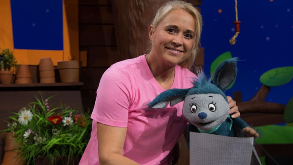 Singa und Fidi entziffern einen Einkaufszettel.