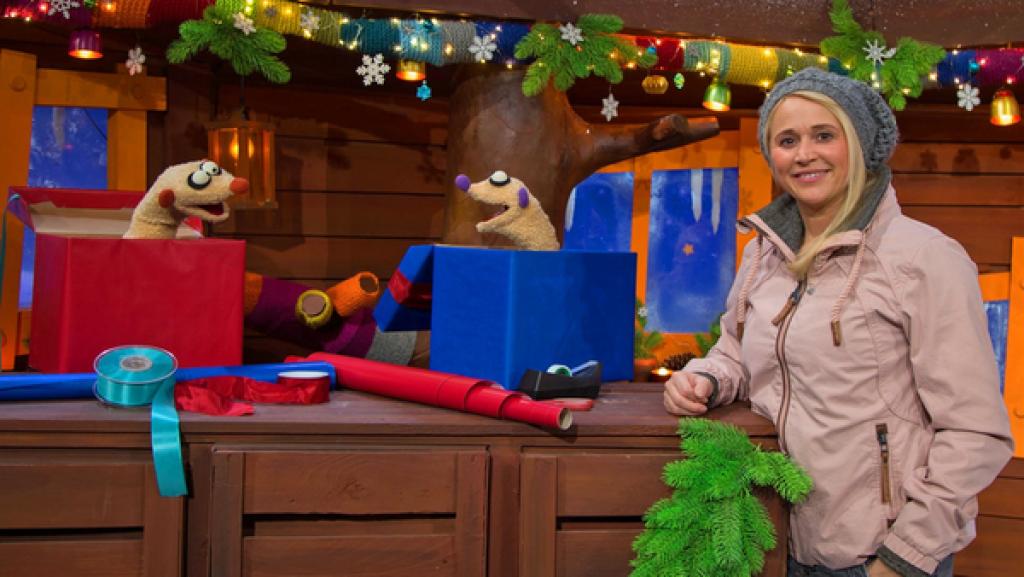 Die Erdmännchen Jan und Henry wollen herausfinden, wie sich ein Geschenk fühlt, kurz bevor es ausgepackt wird.