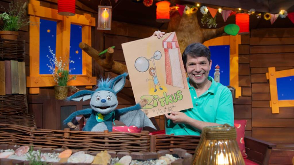 Juri erzählt Fidi vom Zirkus, der bald in die Stadt kommt.