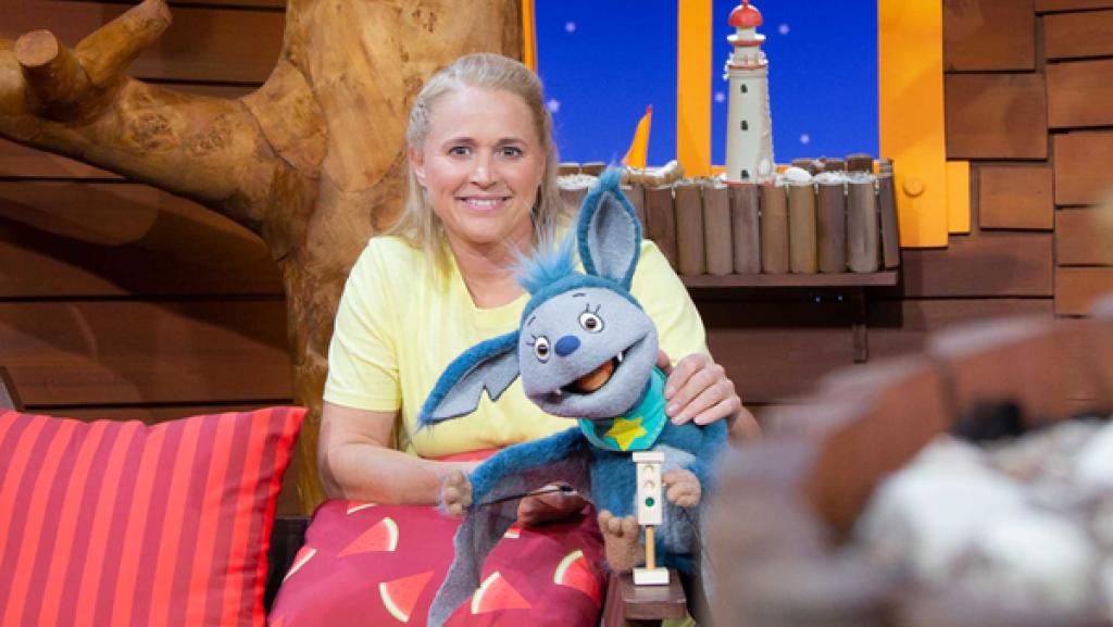 Singa singt Fidi eine Ampel.