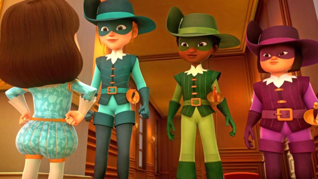 König Louis XIII. steht im Flur des Schlosses mit in die Hüften gestemmten Händen vor den Musketieren, die ihn lächelnd anschauen.