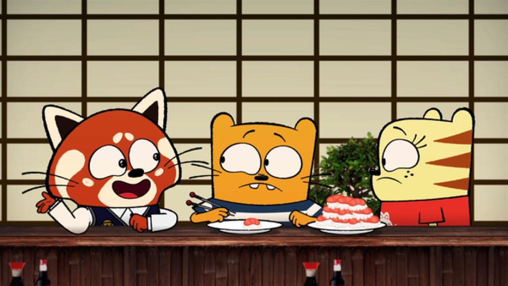 Hiroki (li.) erklärt Ollie und Moon, wie man mit Stäbchen isst.