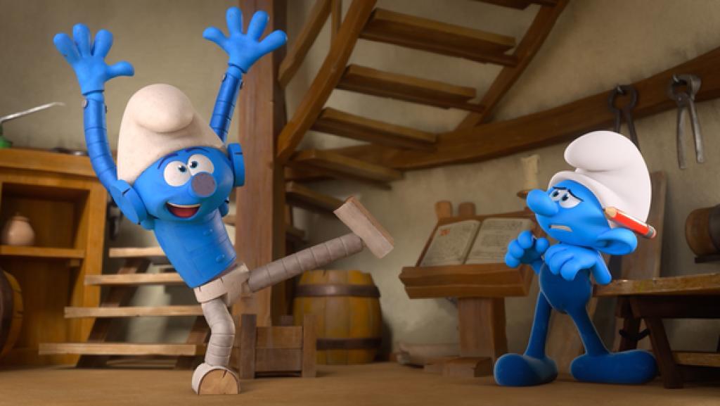 Windelwickler tanzt durch die Werkstatt. Handy steht daneben und schaut kritisch.