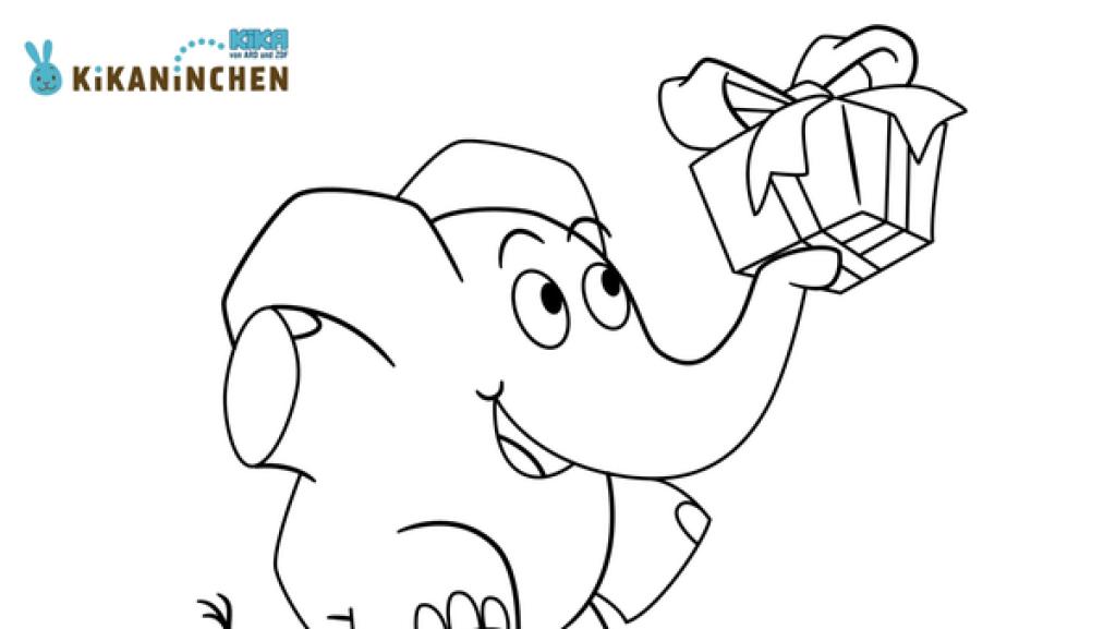 Elefant hält auf seinem Rüssel ein Geschenk 