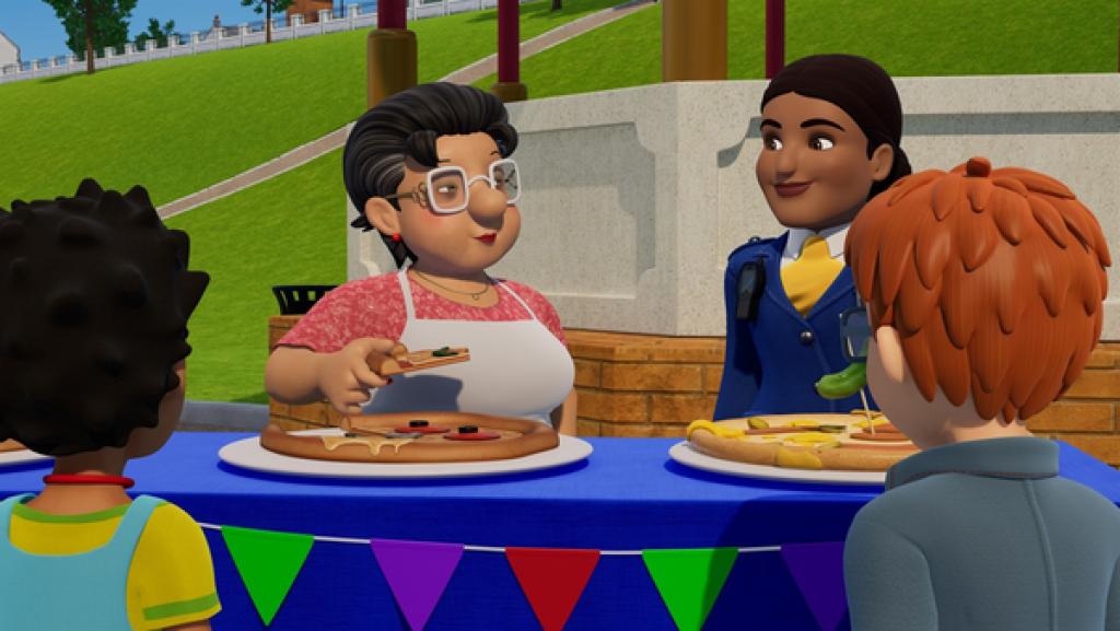 Rechte: KiKA/Prism Art & Design Limited Auf einem Tisch liegen zwei Pizzen. Dahinter stehen Bella und Rose. Bella hält ein Stück Pizza in der Hand. Bella und Rose schauen sich an. Vor dem Tisch stehen zwei Kinder, die Bella und Rose angucken.