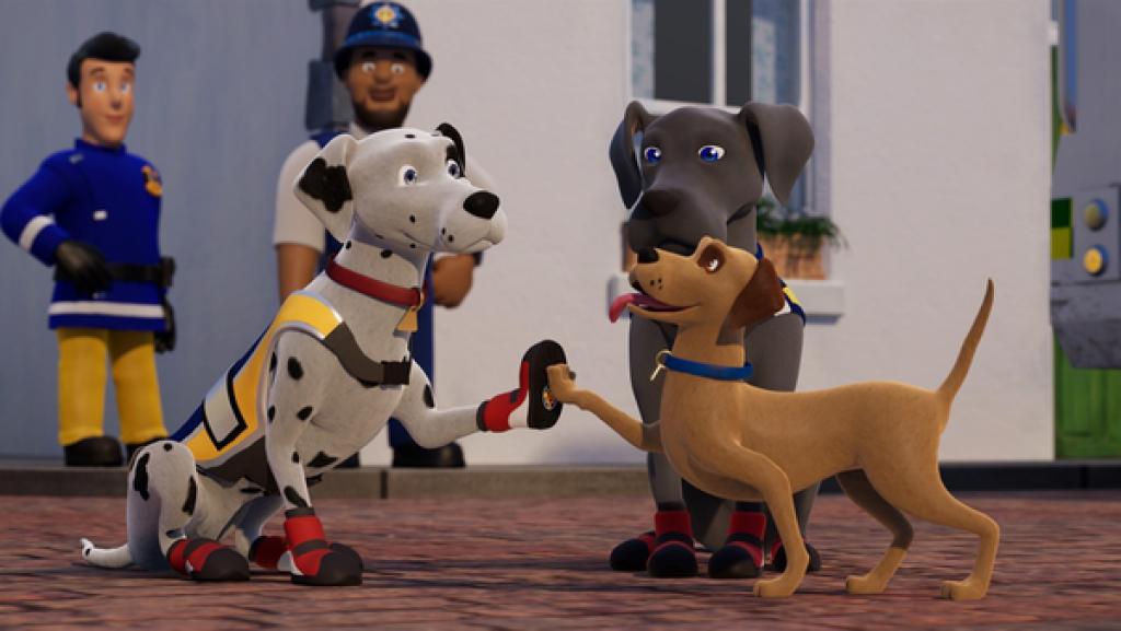 Rechte: KiKA/Prism Art & Design Limited Die drei Hunde Schnuffi, Luna und Buddler mittig auf einer gepflasterten Straße. Schnuffis und Buddlers Vorderpfoten sind zur Begrüßung gehoben und berühren sich. Im Hintergrund stehen Elvis und Malcolm.