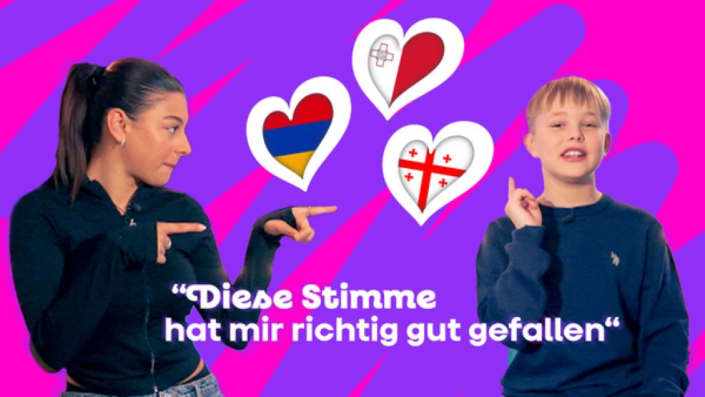 Susan und Bjarne vor pinkem Hintergrund. Neben ihnen Länderflaggen in Herzform.