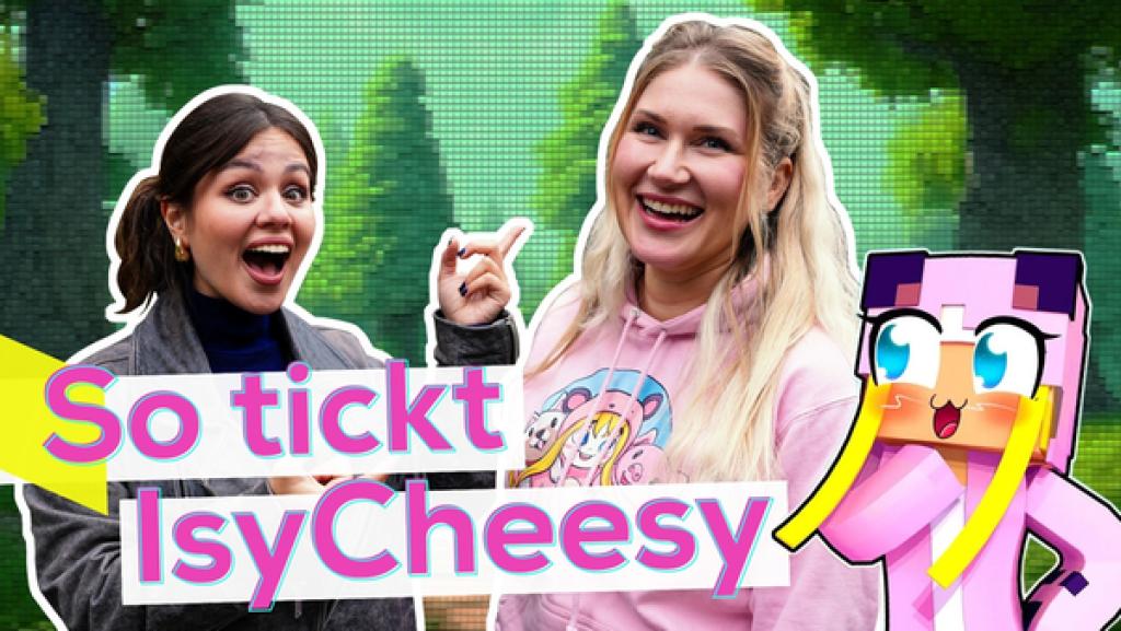 Links Sarah zeigt fröhlich auf Isy. Sie steht rechts und lächelt. Neben ihr ein Bild ihres Comic-Minecraft-Charakters. Aufschrift in Pink: So tickt IsyCheesy.