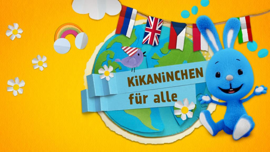 KiKANiNCHEN für alle | Rechte: KiKA Kikaninchen neben einer Weltkugel und Wimpelkette mit verschiedenen Flaggen.
