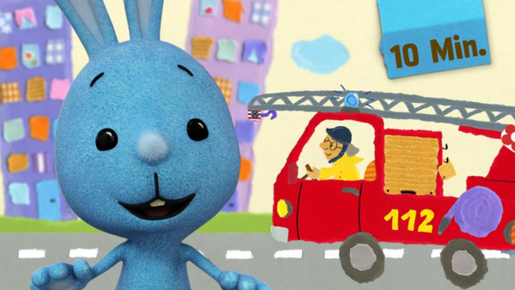 Kikaninchen in der Schnipselwelt neben einem Feuerwehrauto 