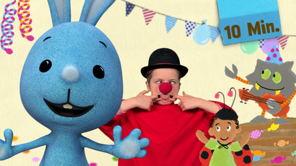 Kikaninchen zusammen mit einem Kinderclown.