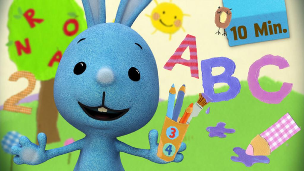 Kikaninchen in der Schnipselwelt umringt von Zahlen und Buchstaben 