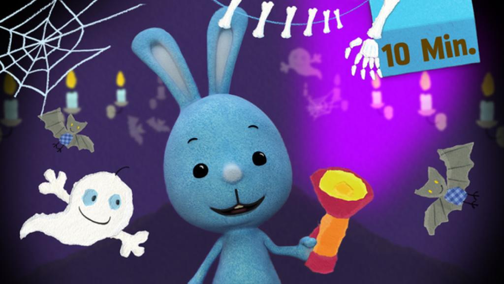 Kikaninchen mit einer Taschenlampe in der Hand neben einem Gespenst. 