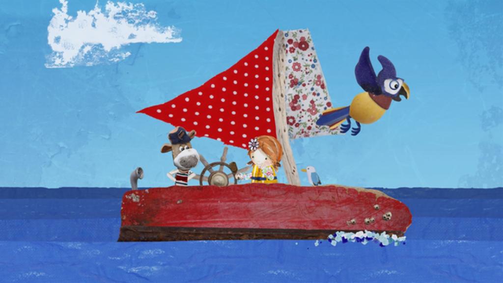 Lily und Salty entdecken einen sprechenden Papagei, der an Saltys Schiff vorbei, direkt auf Strandschatz Eilandzu fliegt.