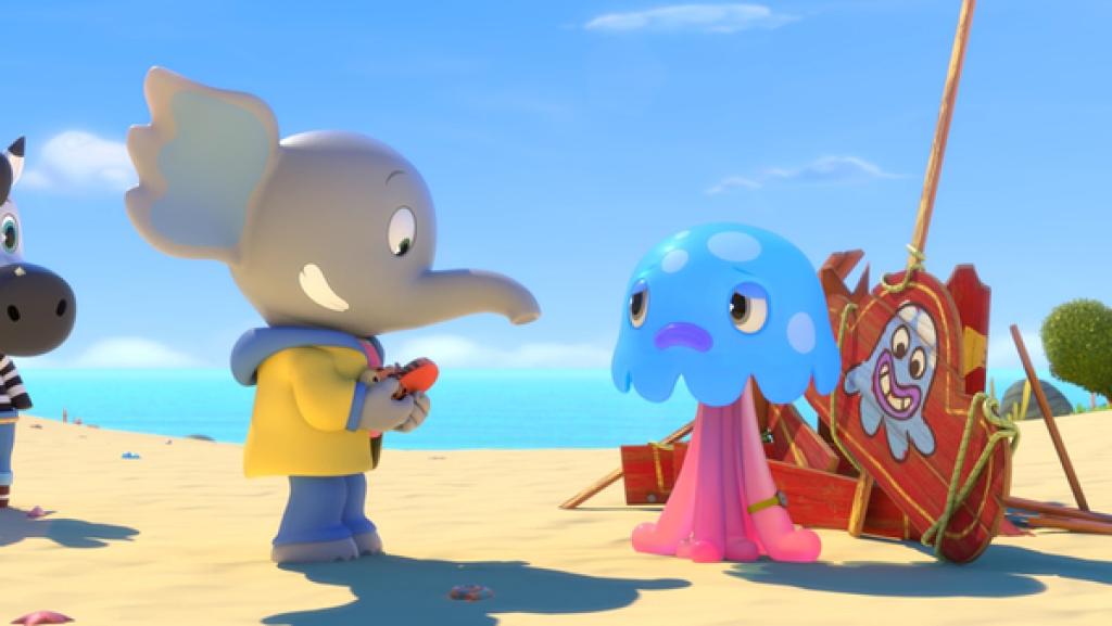 Elefant Mamfie hält Babyschuhe in den Händen. Neben ihm stehen Zebra Shaka und Qualle Takolo.