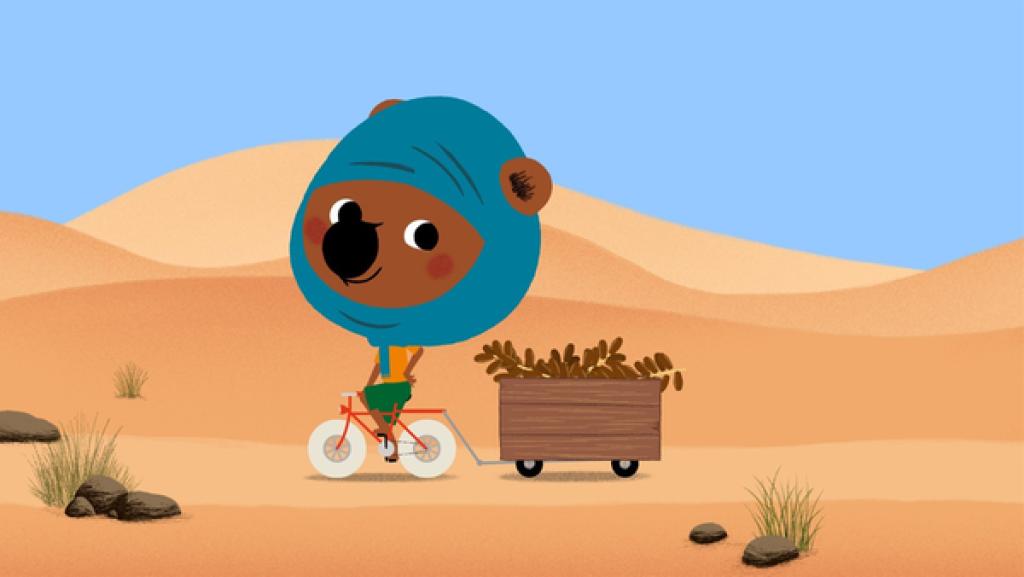 Mouk mit seinem Fahrrad in der Sahara