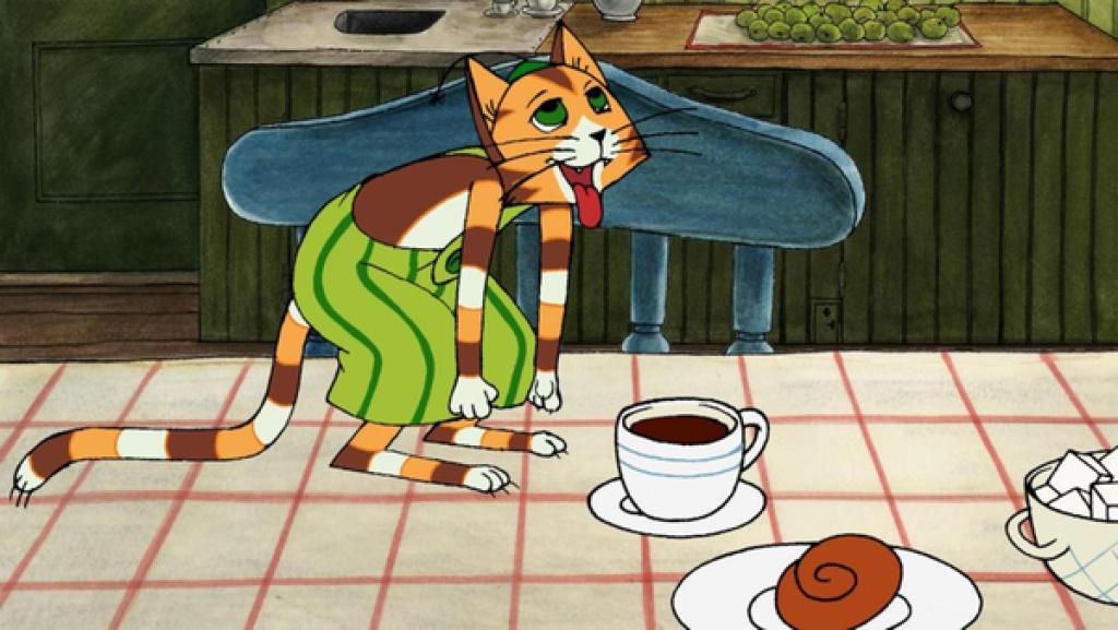 Findus steht mit hängender Zunge auf dem Esstisch. Seine Arme hängen weit nach unten.