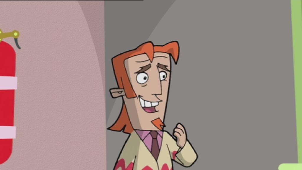 Der Lehrer steht im Klassenraum.