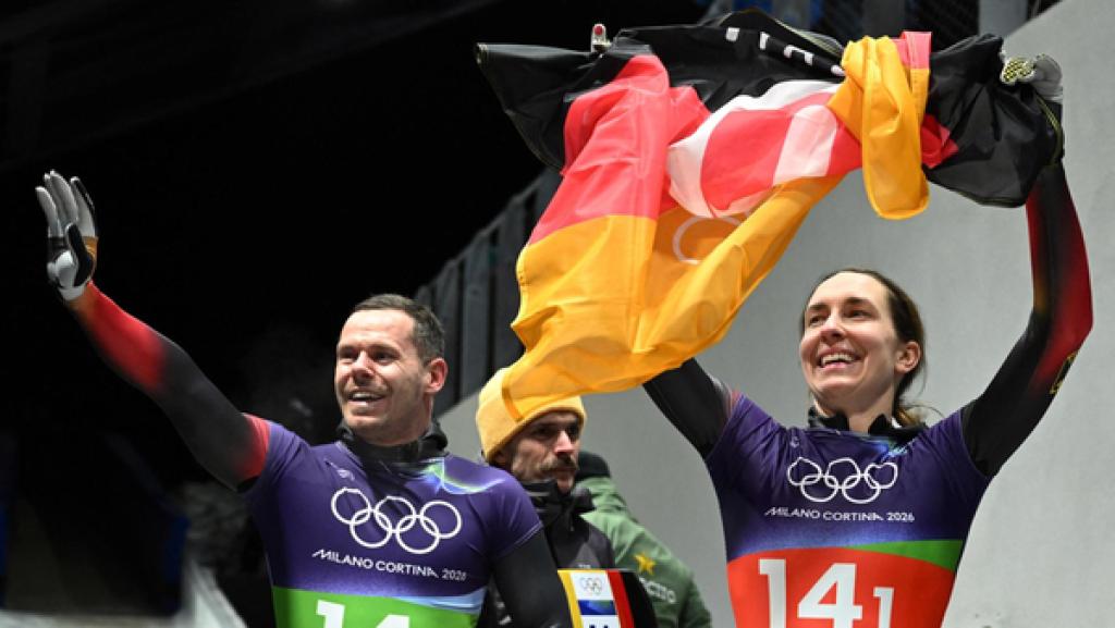 Jacqueline Pfeifer und Christopher Grotheer nach ihrem Lauf. | Rechte: REUTERS / Annegret Hilse Jacqueline Pfeifer und Christopher Grotheer nach ihrem Lauf.